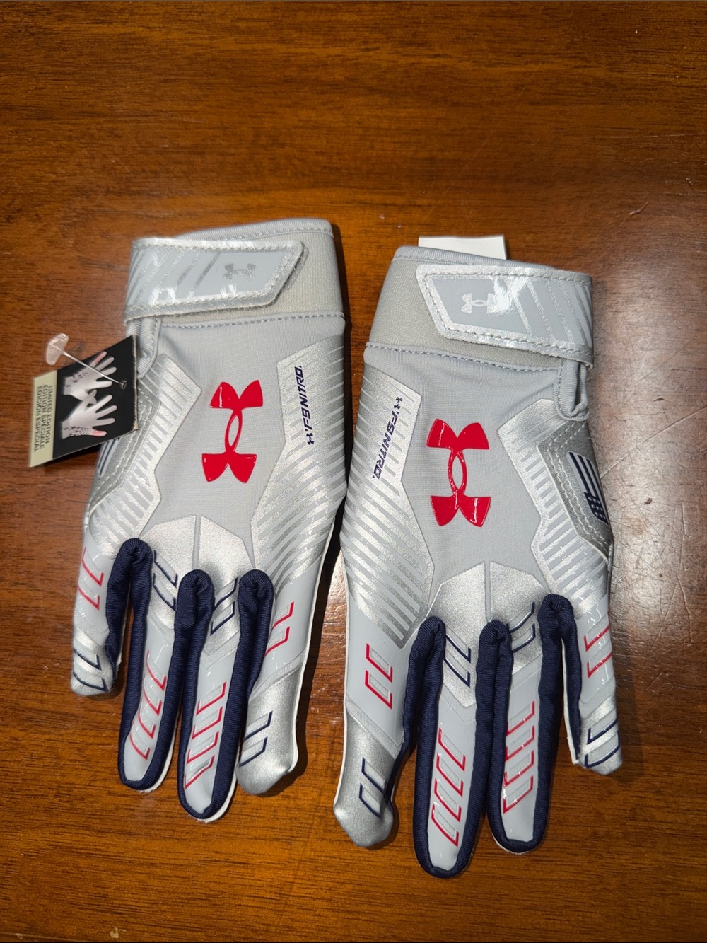 Under Armour Silver & Navy Football Gloves with Red Logo